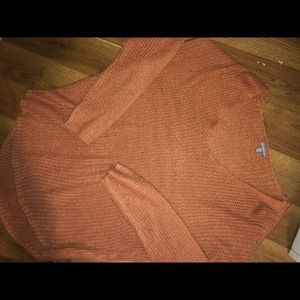 salmon colored sweater